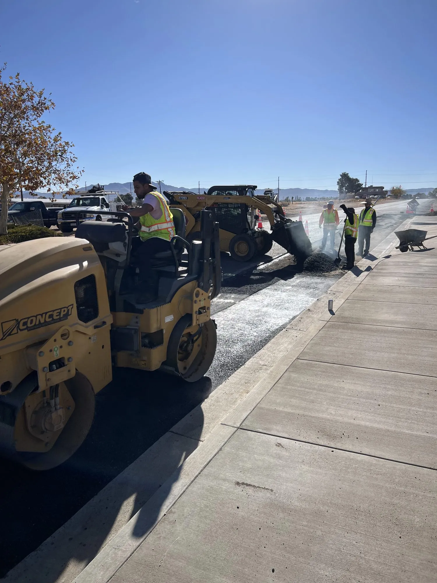 La Habra Concrete Corp crew paving next to a new concrete sidewalk