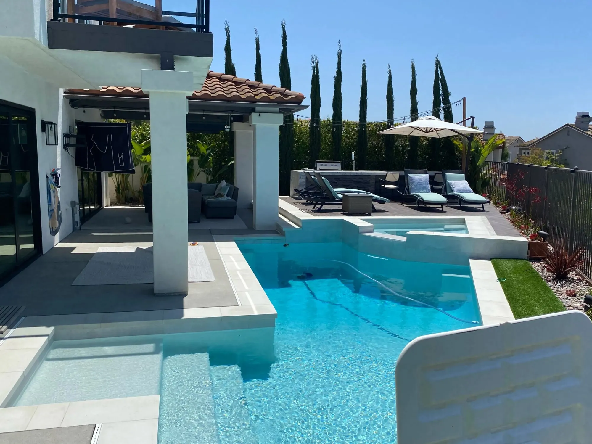 Finished decorative concrete pool deck